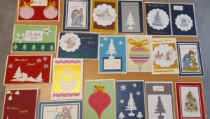 Pakiet kartek bożonarodzeniowych powstałych w ramach zajęć warsztatowych.