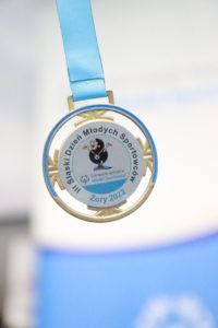 Medal z napisem III Śląski Dzień Młodych Sportowców Żory 2022.